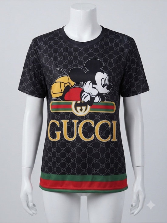 The Unbranded Brand Tops - Silk material Black Graphic Mickey Mouse Logo Tee with Gold Accents